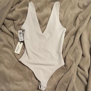 Elegant White V-Neck Bodysuit